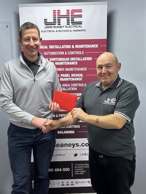 John Heaney Electrical engineer makes generous donation to cancer charity