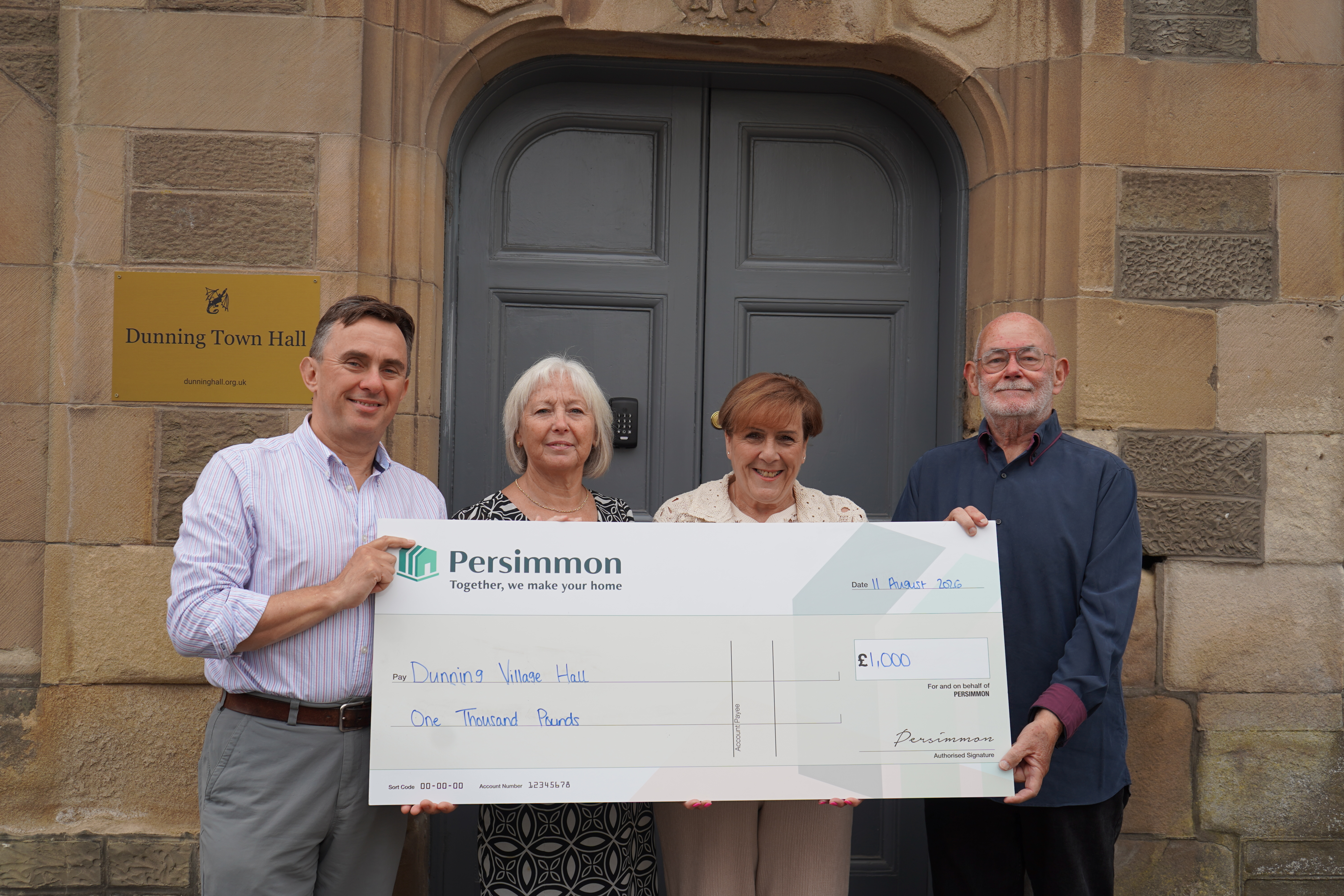 Persimmon gives community group £1,000 for future of Dunning Town Hall