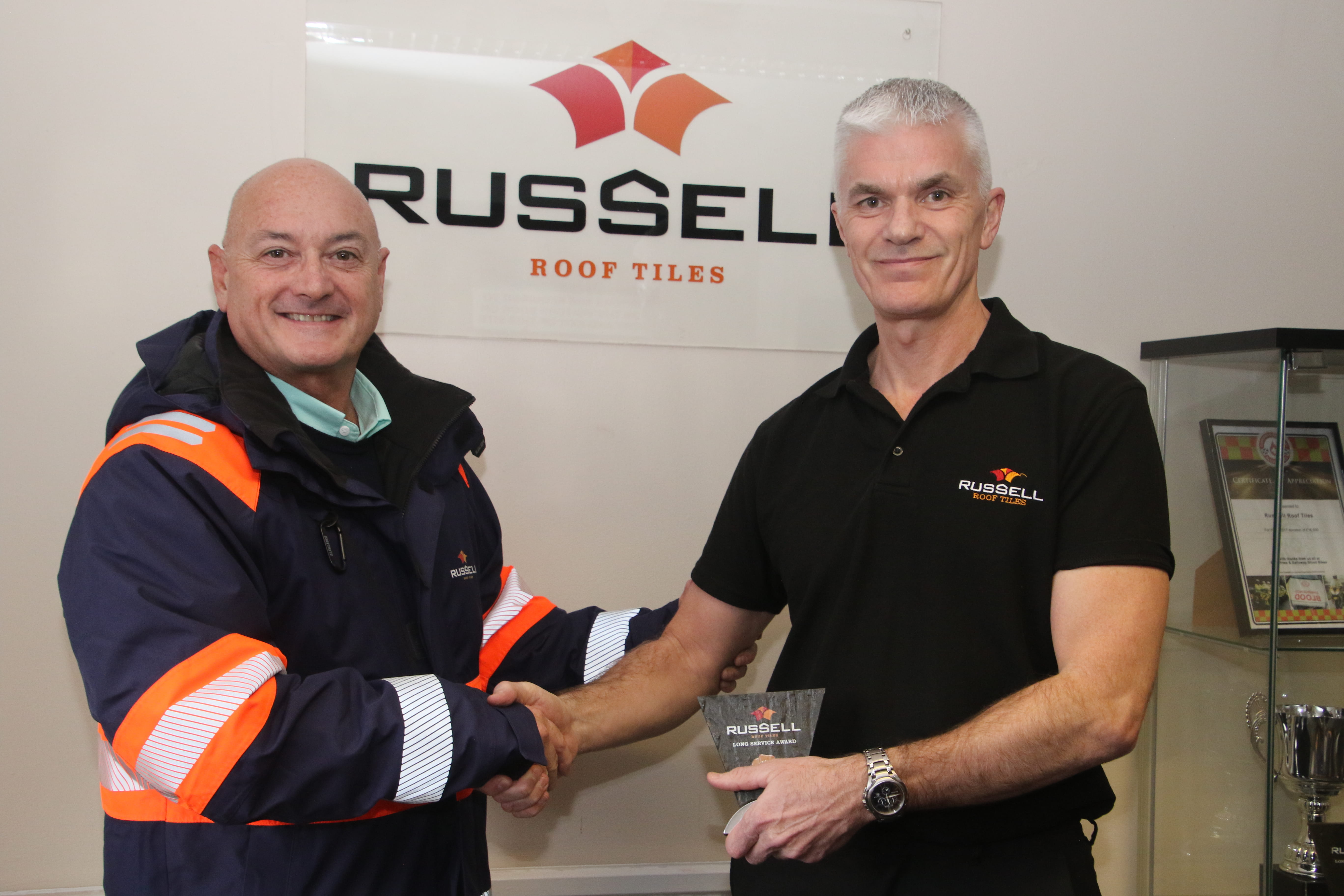 Russell Roof Tiles team marks 65 years of long service