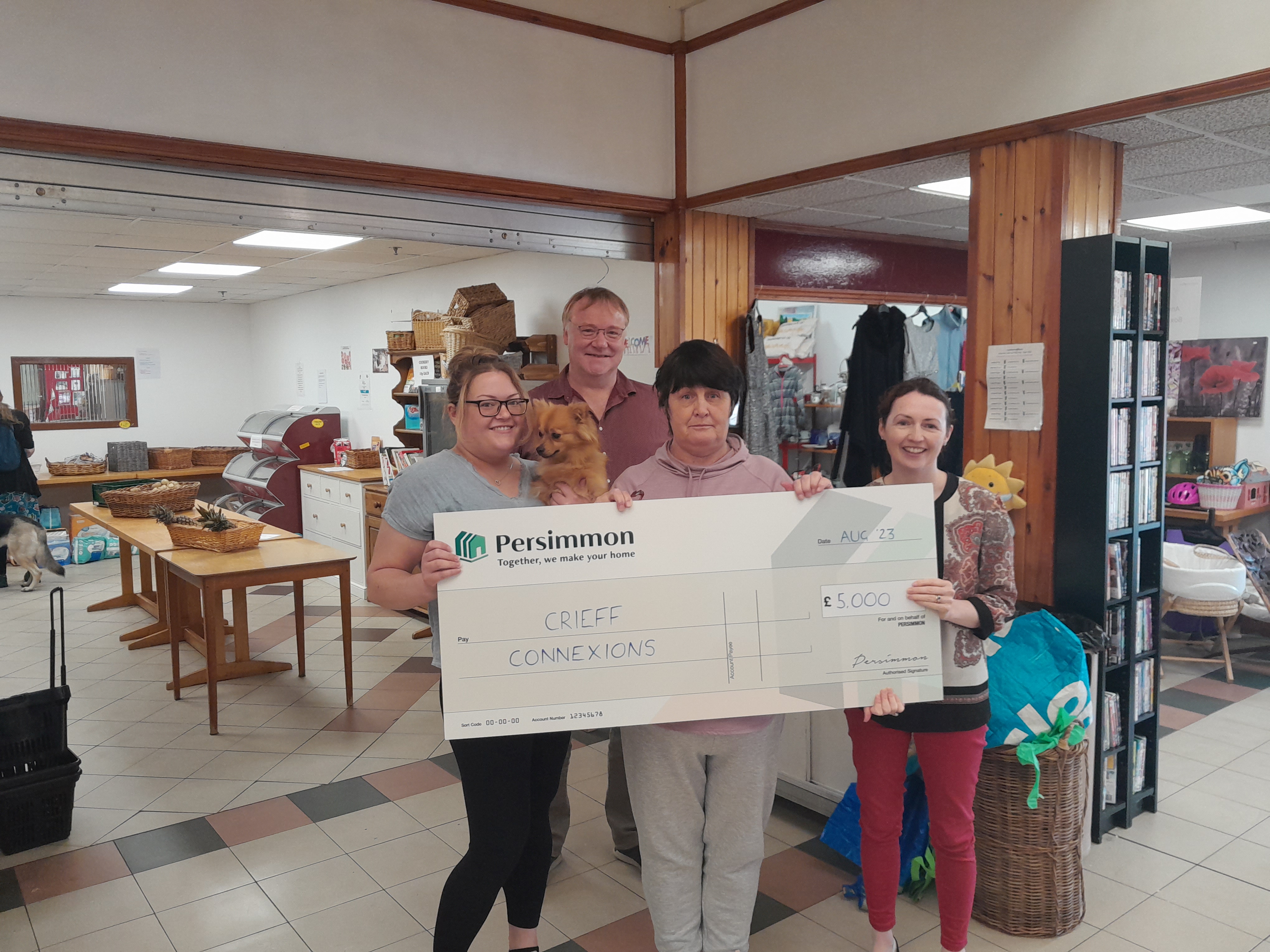 Crieff Connexions cashes community champions cheque from Persimmon