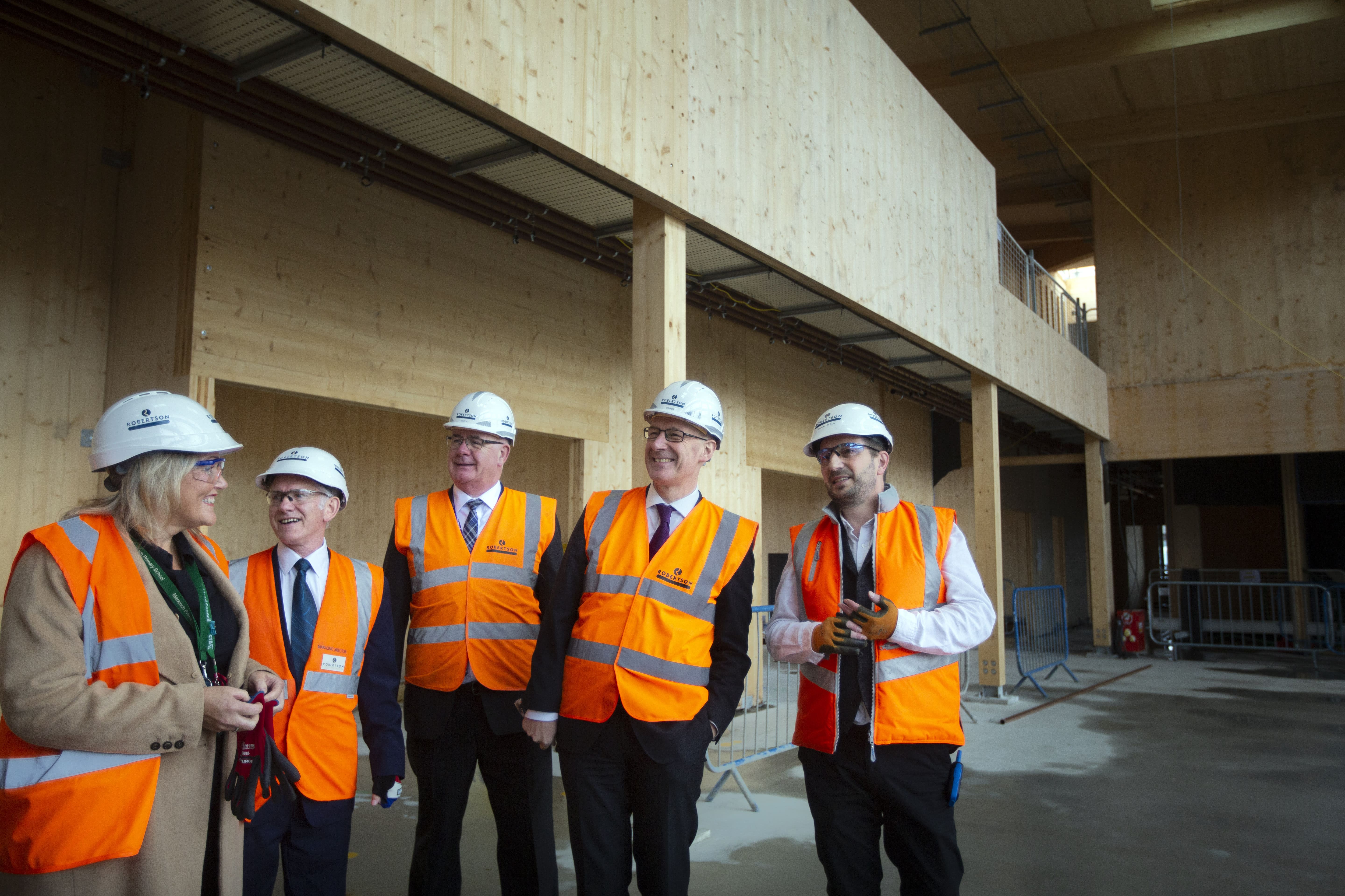 Deputy First Minister marks construction milestone at Highland school