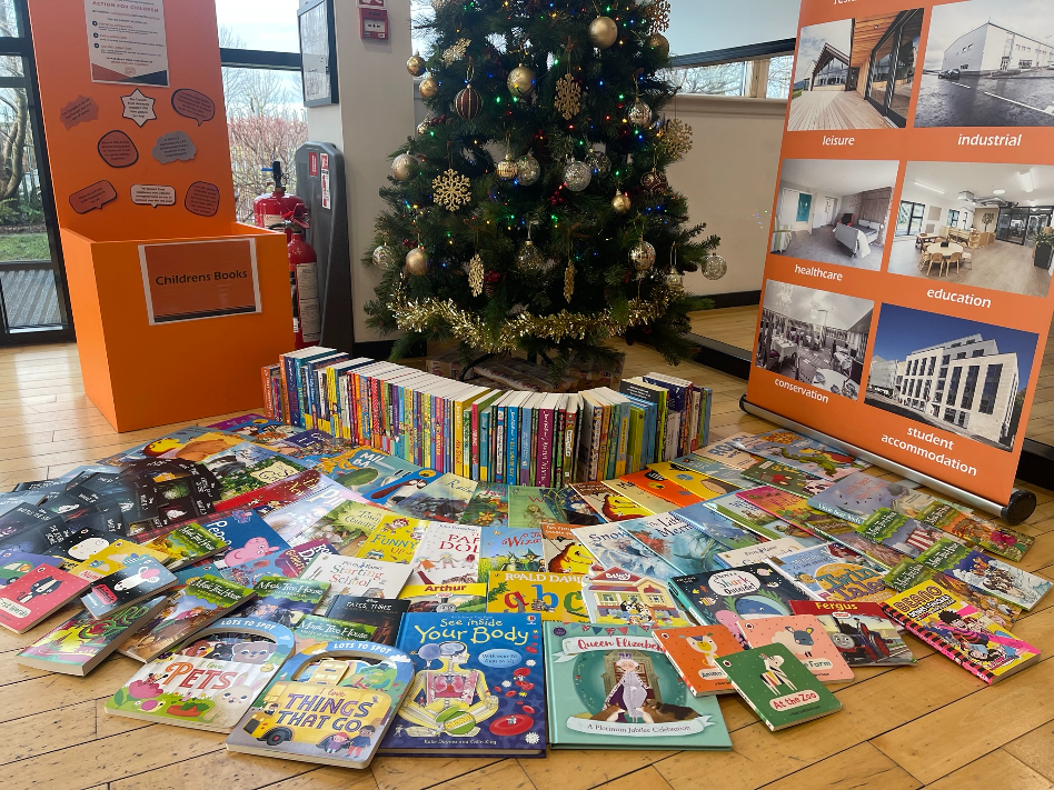 Clark Contracts donates more than 200 books to Action for Children