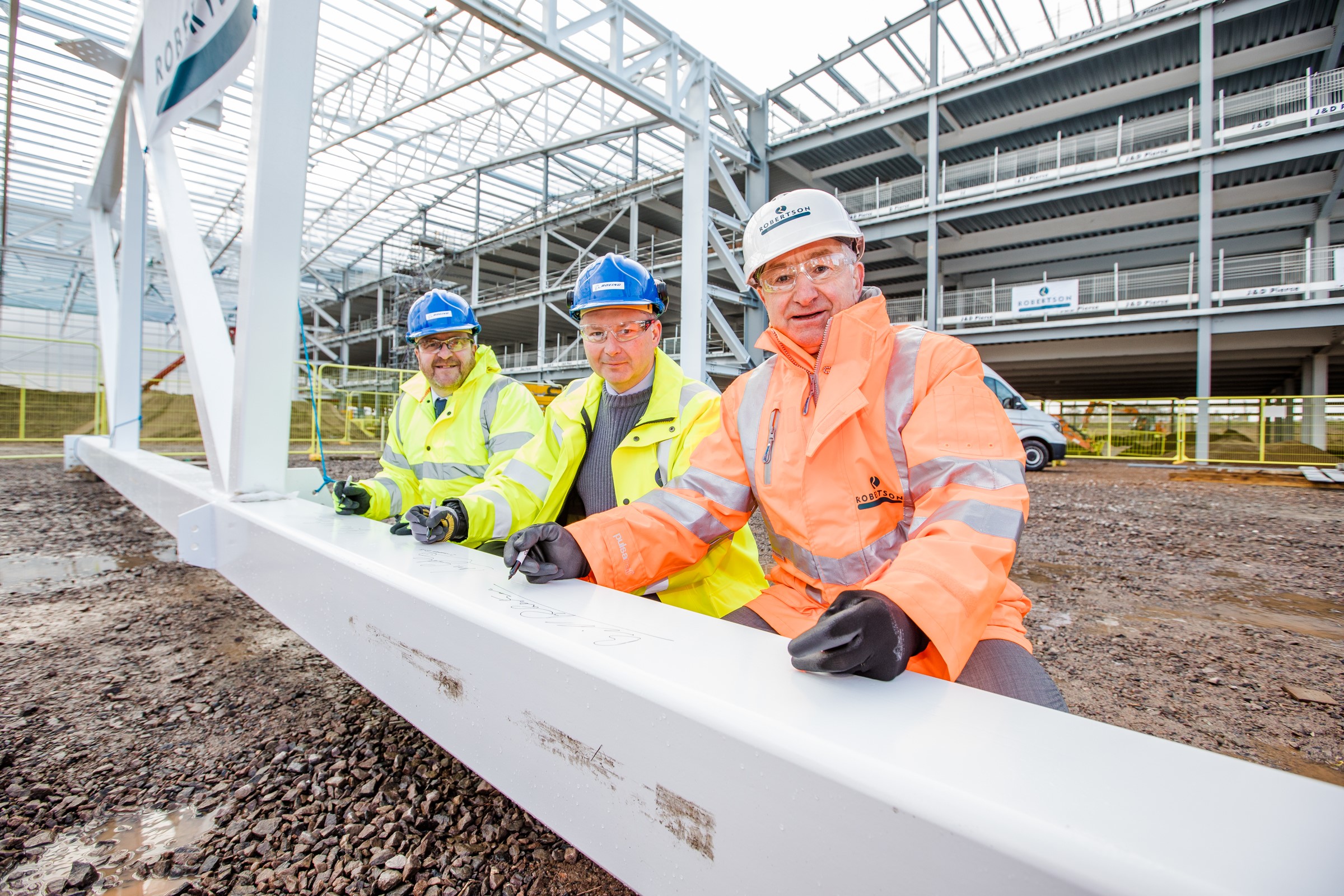 Robertson tops out RAF and Boeing defence aircraft facility in Lossiemouth