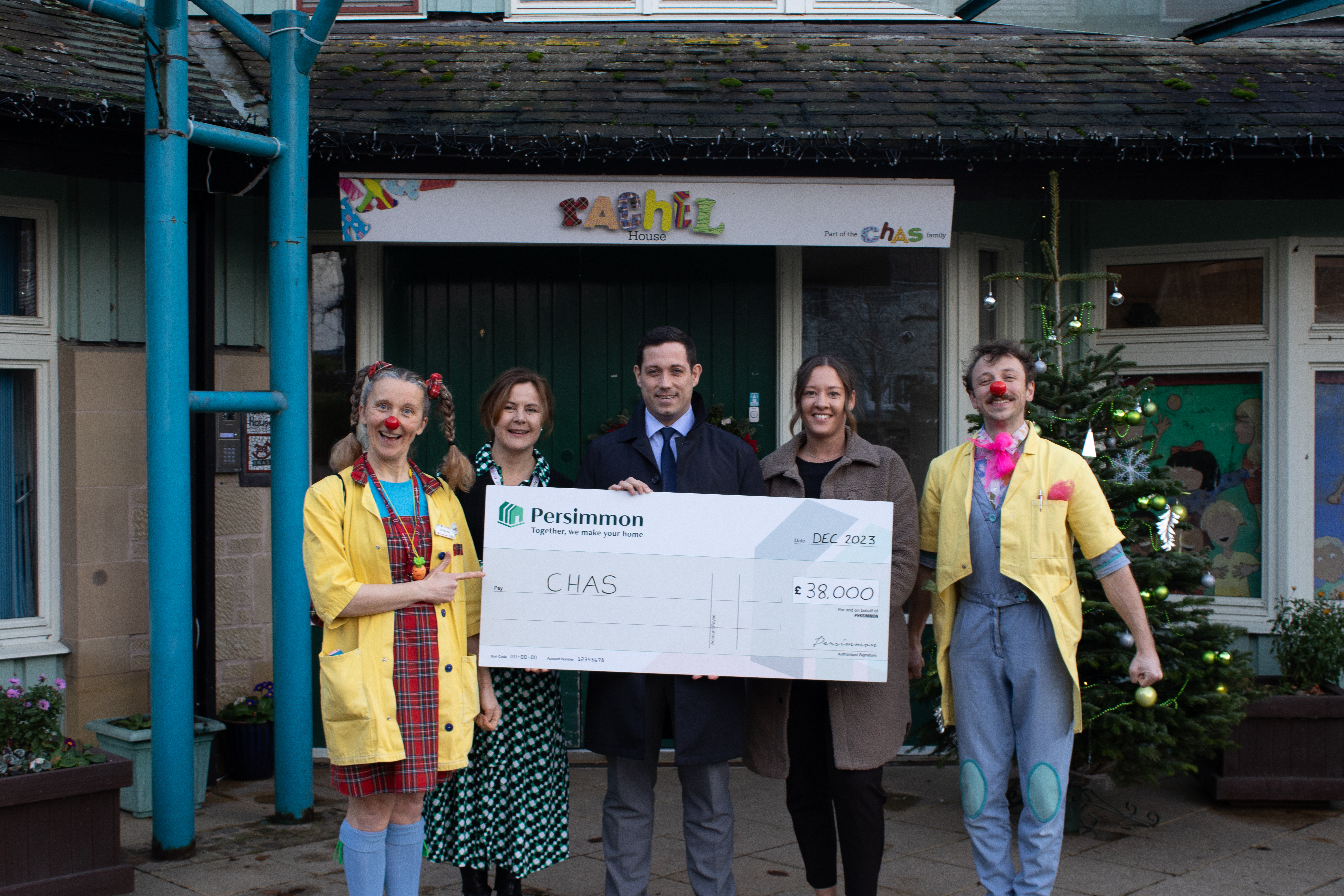 Persimmon spreads Christmas cheer with charity of the year cheque to CHAS