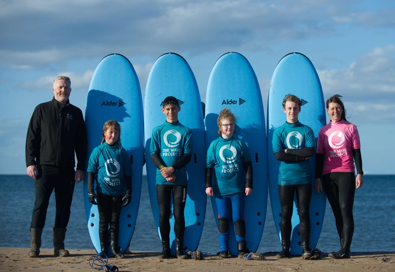 Surf therapy charity makes waves with new kit thanks to Cala support