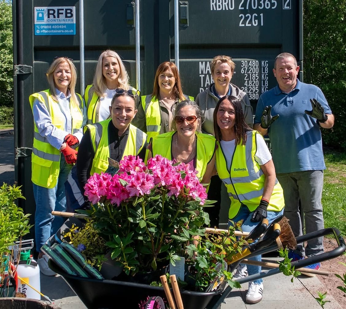 Bellway volunteers dig in to help Hamilton group