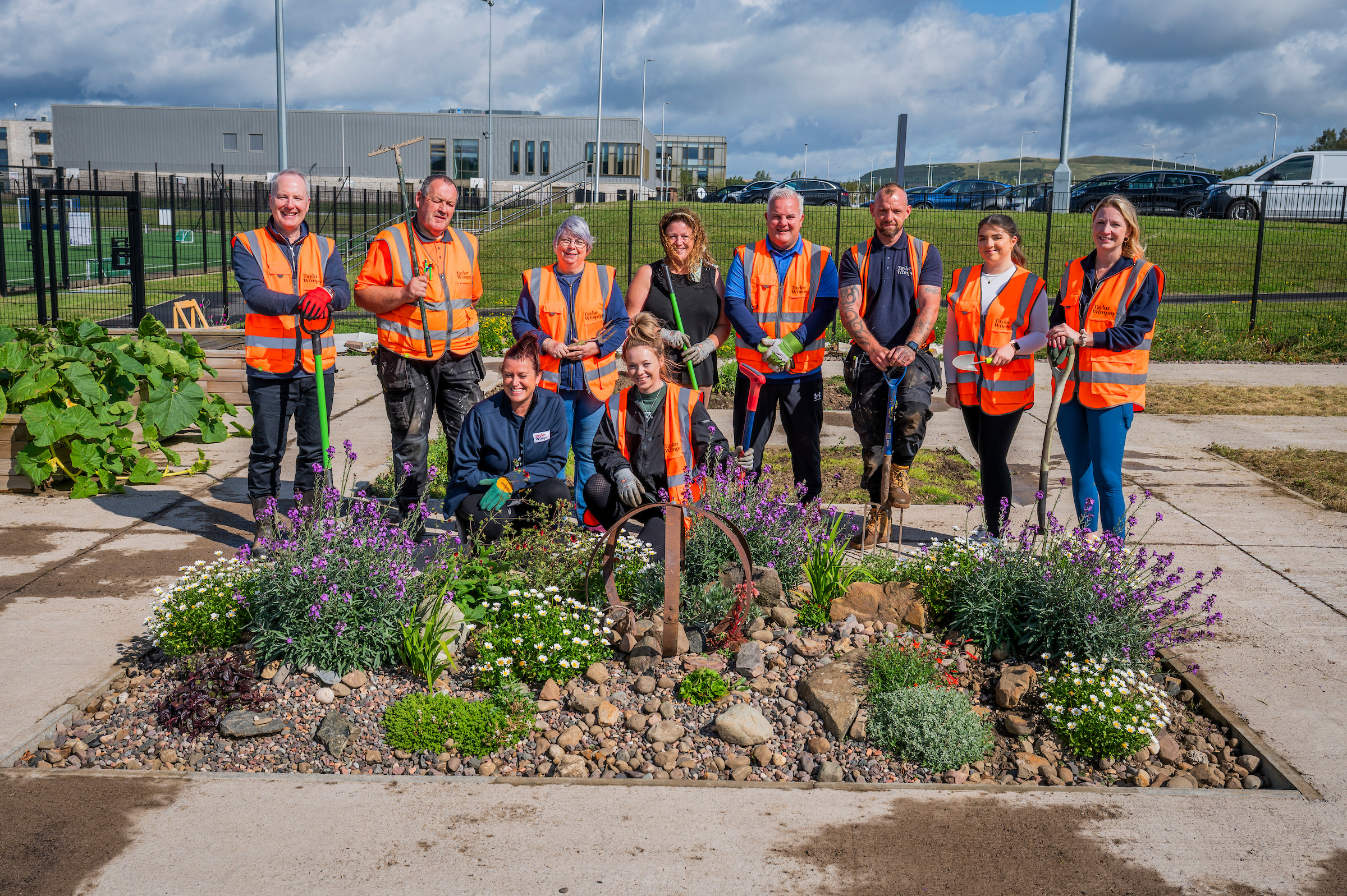 Taylor Wimpey volunteers lend a hand at Woodmill High School's allotment project