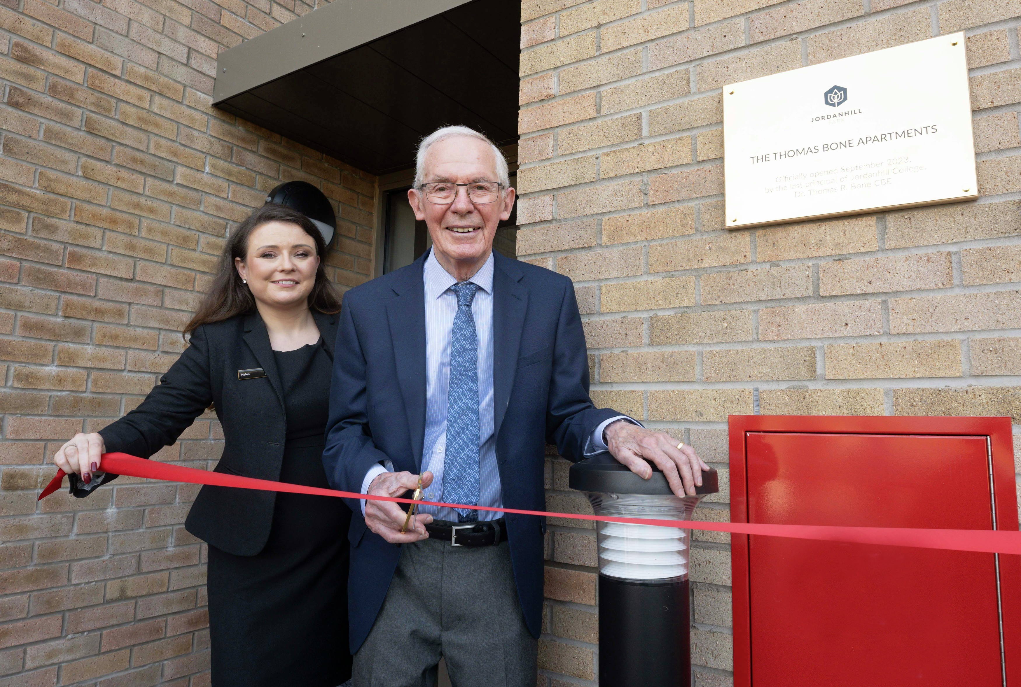 Dr Thomas Bone CBE unveils Cala apartment building in his honour