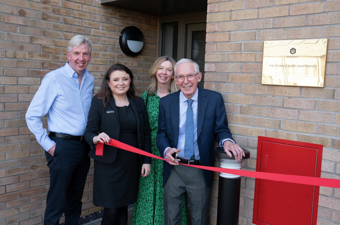Dr Thomas Bone CBE unveils Cala apartment building in his honour