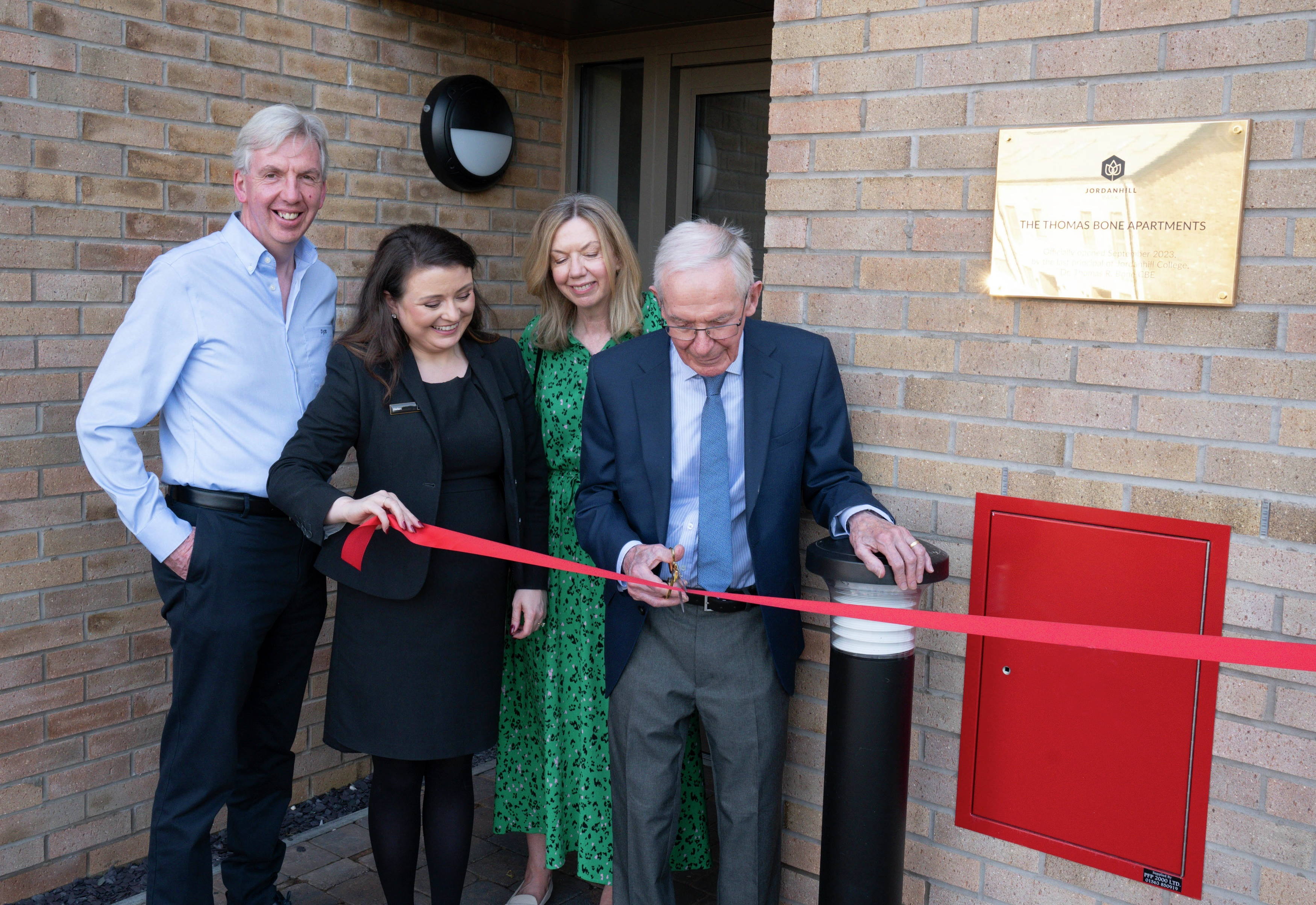 Dr Thomas Bone CBE unveils Cala apartment building in his honour